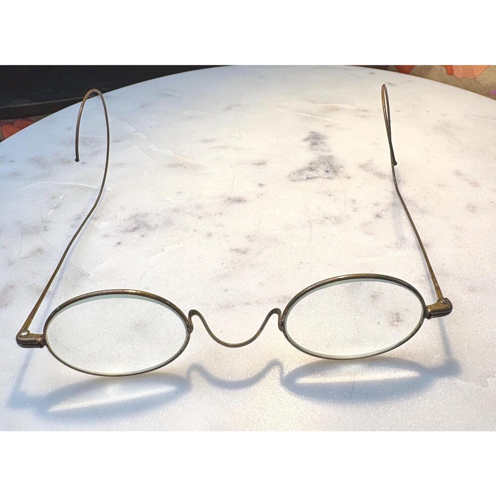 Vintage or antique wire rim spectacles or eyeglasses made by Herman Davis & Sons